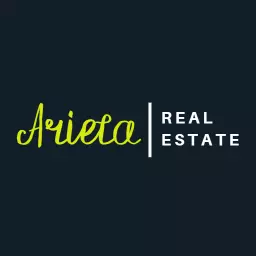 Elegant Green and White Wordmark Showcasing Real Estate Logo Template